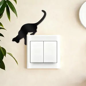 Black acrylic cat switch sticker detail, minimalist wall decor for home bedroom living room.