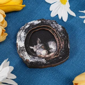 Detailed view of the wooden animal tree hole magnetic decorative craft with sleeping donkey.