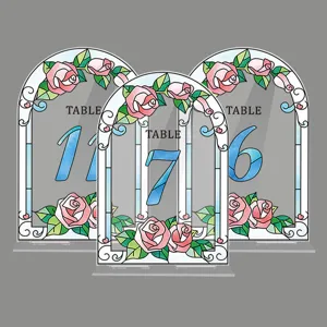 Acrylic wedding table number sign with arched stained glass rose pattern for party decor.