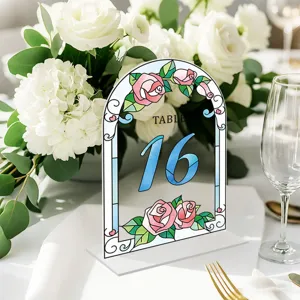 Acrylic wedding table number card detail showing stained glass rose design and number 16.