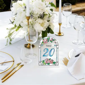 Acrylic table number sign with floral stained glass design for wedding party table decor.