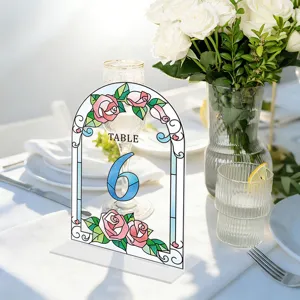 Clear acrylic table number sign with floral stained glass design showing number 6 detail.