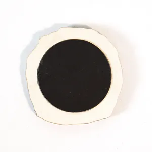 Wooden magnet back detail shot, sturdy circular magnetic backing for secure fridge attachment.