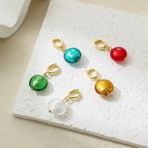 Glass bead charms detail shot, colorful round pendant for DIY keychain and necklace accessories.