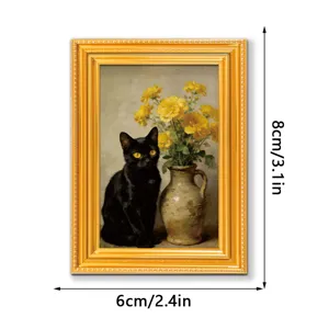Detailed close-up of vintage gold framed black cat and yellow flower oil painting fridge magnet.