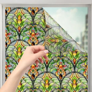 Detailopname van de statische raamfolie met prachtig kleurrijk bloemmotief in 3D reliëf.