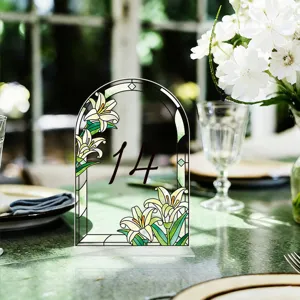 Acrylic wedding table number sign with stained glass lily flower design and stable base.