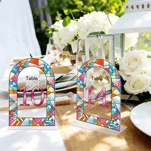 Acrylic table number sign detail view, arch stained glass design for wedding party table decor.