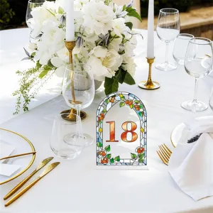 Acrylic table number card with stained glass arch design showing number 18 for party decor.