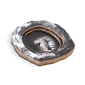 Detail view of the wooden tree-hole cat fridge magnet home decor craft, showcasing fine texture.