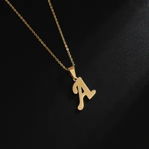 Detailed close-up of a gold stainless steel letter A pendant necklace, stylish and chic.