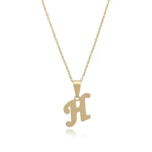 Gold stainless steel letter H pendant necklace with delicate chain jewelry detail view.