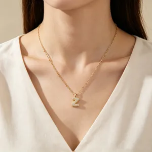 Gold stainless steel necklace with sparkling rhinestone letter Z pendant for women fashion.