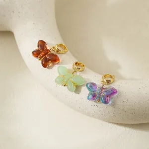 Glass butterfly clasp DIY pendant detail shot, colorful handmade jewelry accessory.