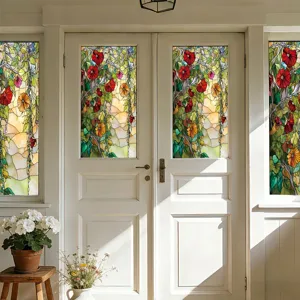 Close-up view of the stained glass window film featuring elegant floral vine patterns.