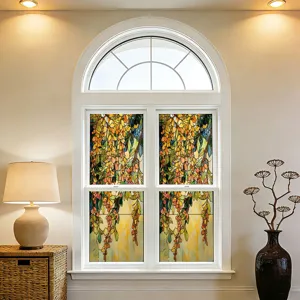 Stained glass window film showing floral botanical pattern in interior window scene detail.