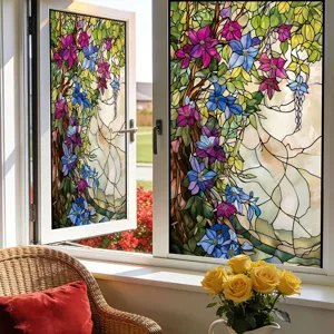 Detailed view of colorful stained glass window film featuring elegant floral vine patterns.