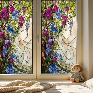 Decorative stained glass window film with vibrant floral vine pattern for home decor detail.