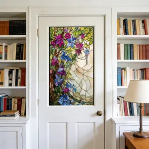 Window glass sticker detail showing floral stained glass pattern applied on white door.