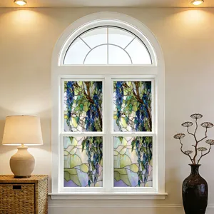 Stained glass window film detail showcasing floral vine pattern for elegant home interior.
