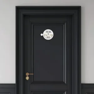 Wooden magnetic pet status door sign detail view showing the rotating indicator mechanism clearly.