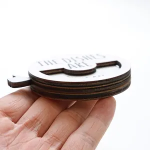 Wooden dish status sign close-up, rotatable magnetic kitchen reminder detail view