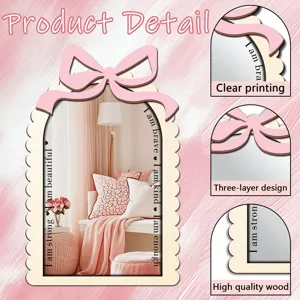 Close-up detail of wooden acrylic decorative mirror, showcasing clear printing and bow.