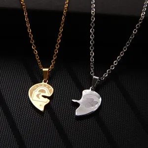 Titanium steel heart puzzle couple necklace pendant detail shot, stylish lover matching jewelry.