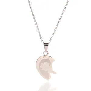 Stainless steel heart key puzzle couple necklace, elegant silver pendant for lovers.