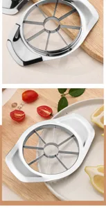 Stainless steel apple cutter core slicer kitchen fruit divider detail closeup view.