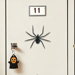 Detailed view of 3D printed black spider Halloween magnetic sticker for fridge and home decor.