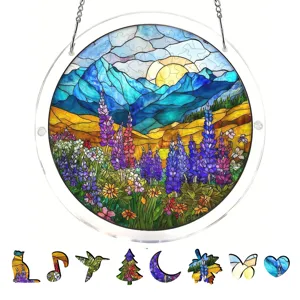 Stained acrylic suncatcher window hanging with scenic mountain landscape and fun puzzle pieces.