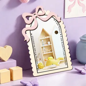 Wooden acrylic mirror desktop decoration with pink bow and inspiring text for bedroom.
