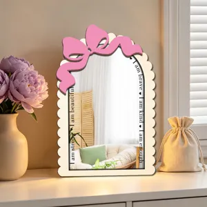 Wooden acrylic decorative mirror with pink bow, inspirational text, perfect bedroom table decor.