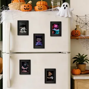 Halloween wooden picture frame magnet set detail showing funny ghost art prints on fridge.