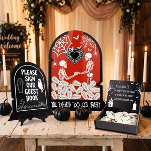 Detailed view of Halloween wedding guest book drop box set with wooden tombstone frame.