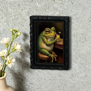 Detailansicht des Vintage Frosch Fotorahmen Kühlschrankmagneten, süße Tier Deko für Küche.