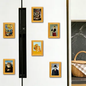 Detailed view of funny cat art wooden fridge magnets on a white refrigerator for home decor.