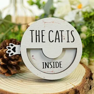 Wooden magnetic cat status sign detail, rustic pet reminder decor plate for home.