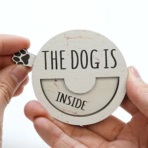Detailed wooden pet status sign featuring a rotating disc design and clear lettering.