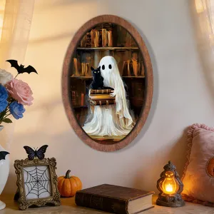 Close-up view of the vintage oval wooden framed Halloween ghost and black cat wall hanging sign.