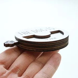 Wooden magnetic rotating pet status indicator, cute paw print design, durable desk sign.