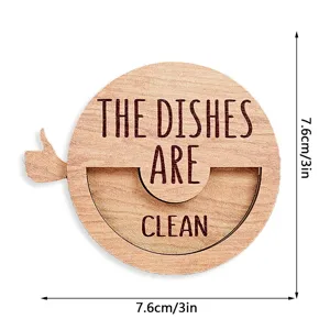 Wooden dishwasher magnet detail showing the clean status text and compact size for kitchen use.