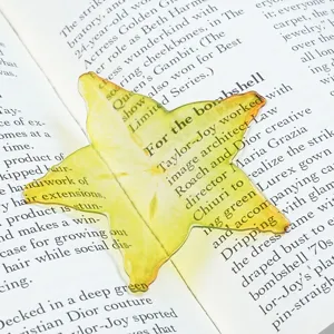 Transparent acrylic starfruit bookmark, translucent yellow reading page marker for books.