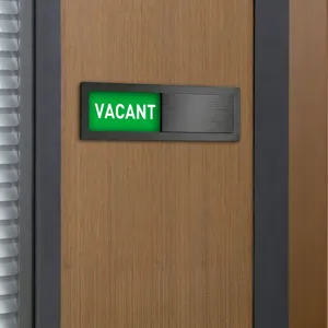 Acrylic magnetic office door status sign detail showing green vacant sliding indicator.