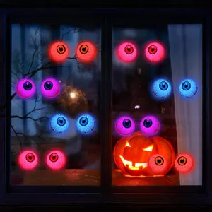 Gruselige Halloween LED Leuchte Augen Wandbehang Detail, bunte leuchtende Deko für schaurige Feste.