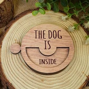 Wooden pet status sign detail, rotatable magnetic design, natural wood texture, close-up view.