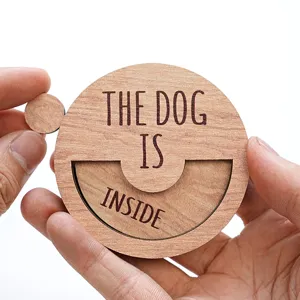 Wooden magnetic pet status sign close-up, fun rotating dog reminder board for home decor.