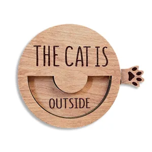 Wooden cat status sign with magnetic rotating design and cute paw print for pet lovers.