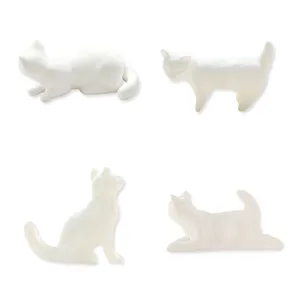 Detailed view of cute white cat fridge magnets featuring 4 different poses, perfect for home decor.